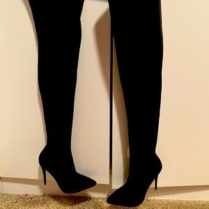 Black knee high boots in box
